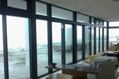 Waterfront-Home_Walls-of-glass_Impact-windows-and-doors