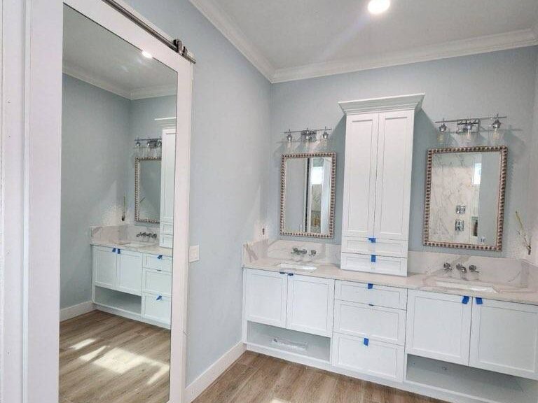 Custom Mirrored Barn Door Installed by Lemon Bay Glass. Full-Length Mirror cut to fit Sliding Barn Door.